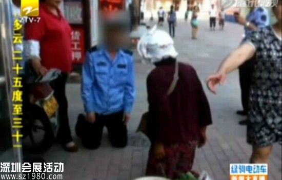 城管與大媽當(dāng)街互跪：人性化執(zhí)法的進(jìn)步(視頻/圖)